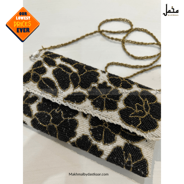 White hand made clutches